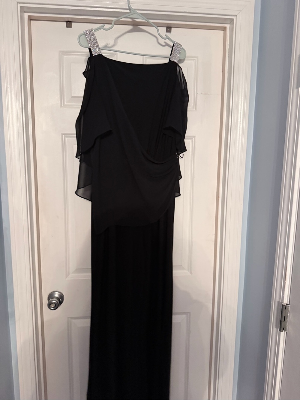 Black jumpsuit with Sheer Draped Overlay and silver bedazzlement